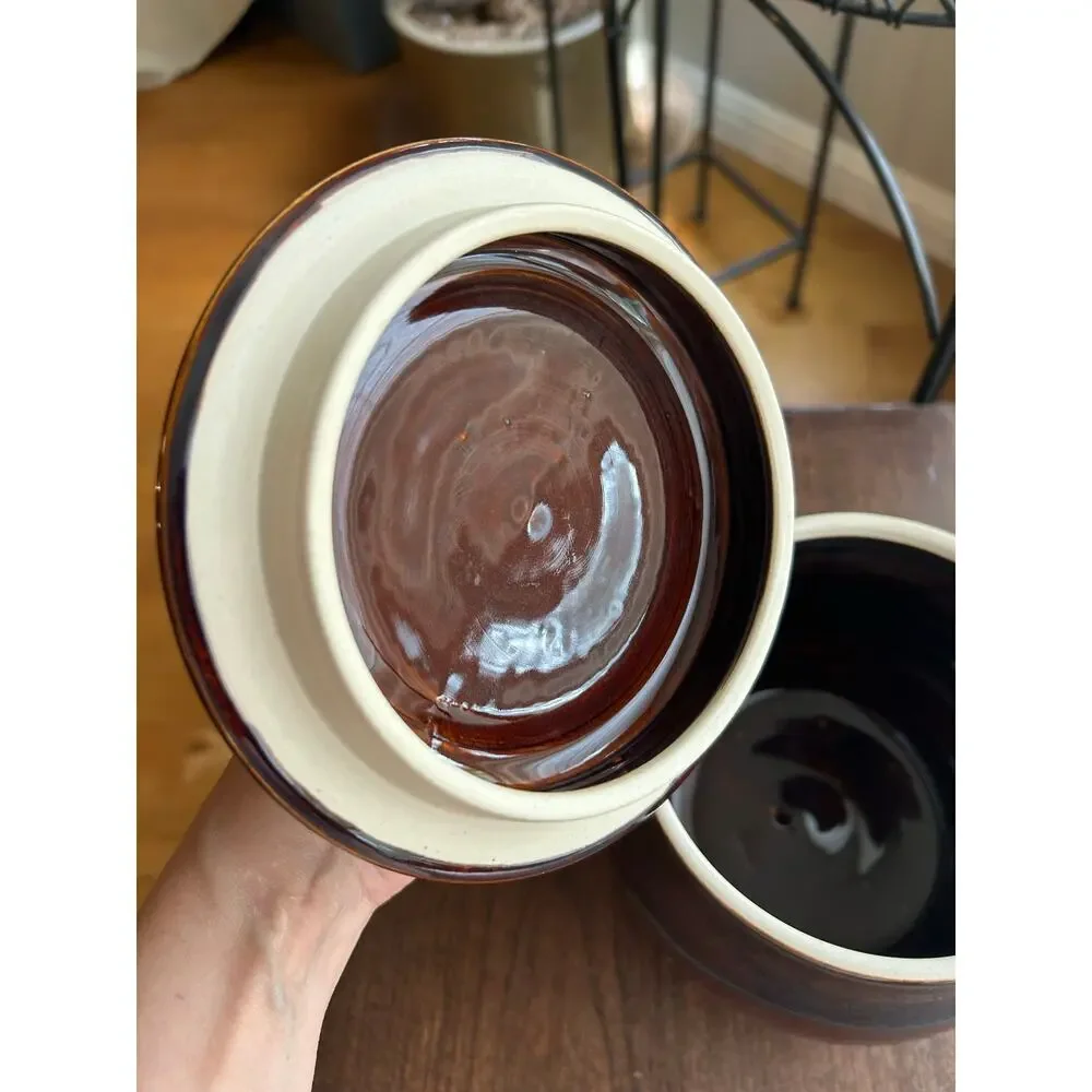 Mudipaws Pottery ceramic treat jar topped w/ a dachshund by artist Debi Manduca